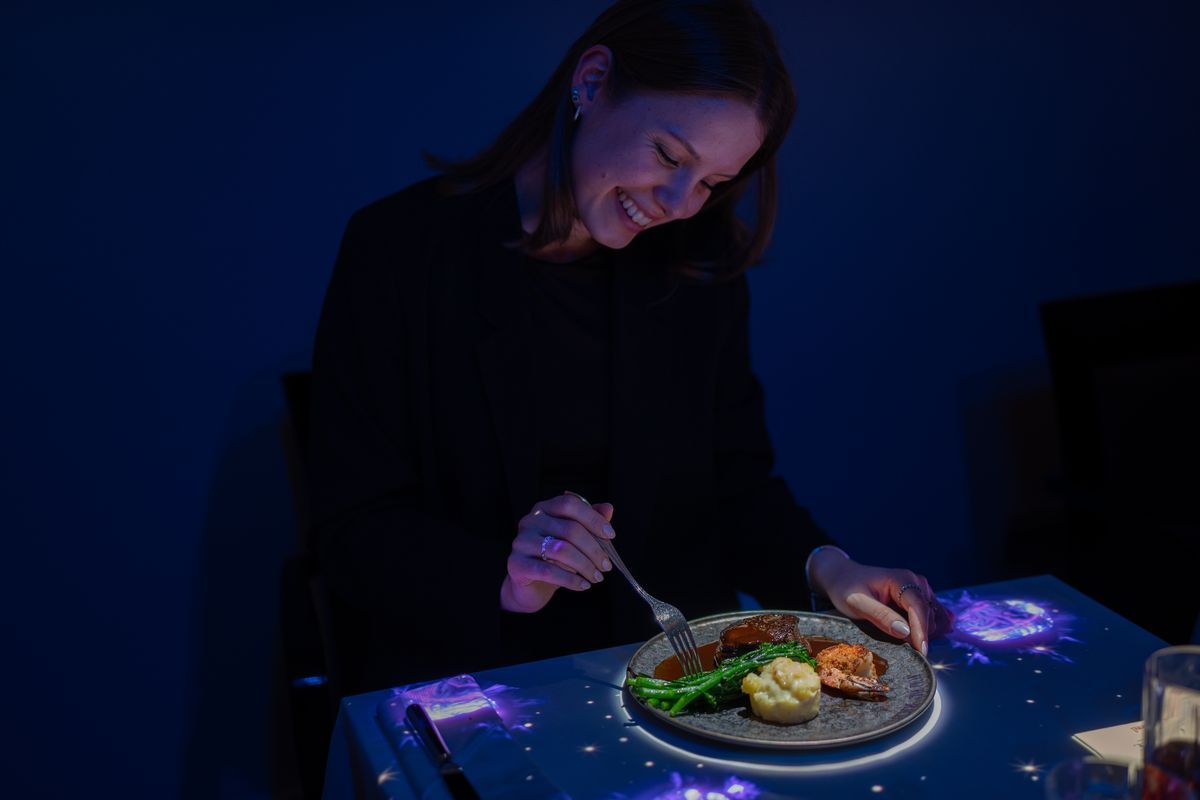 The Magic Table Amsterdam — a magical moment at the illuminated dinner table at Andaz Prinsengracht
