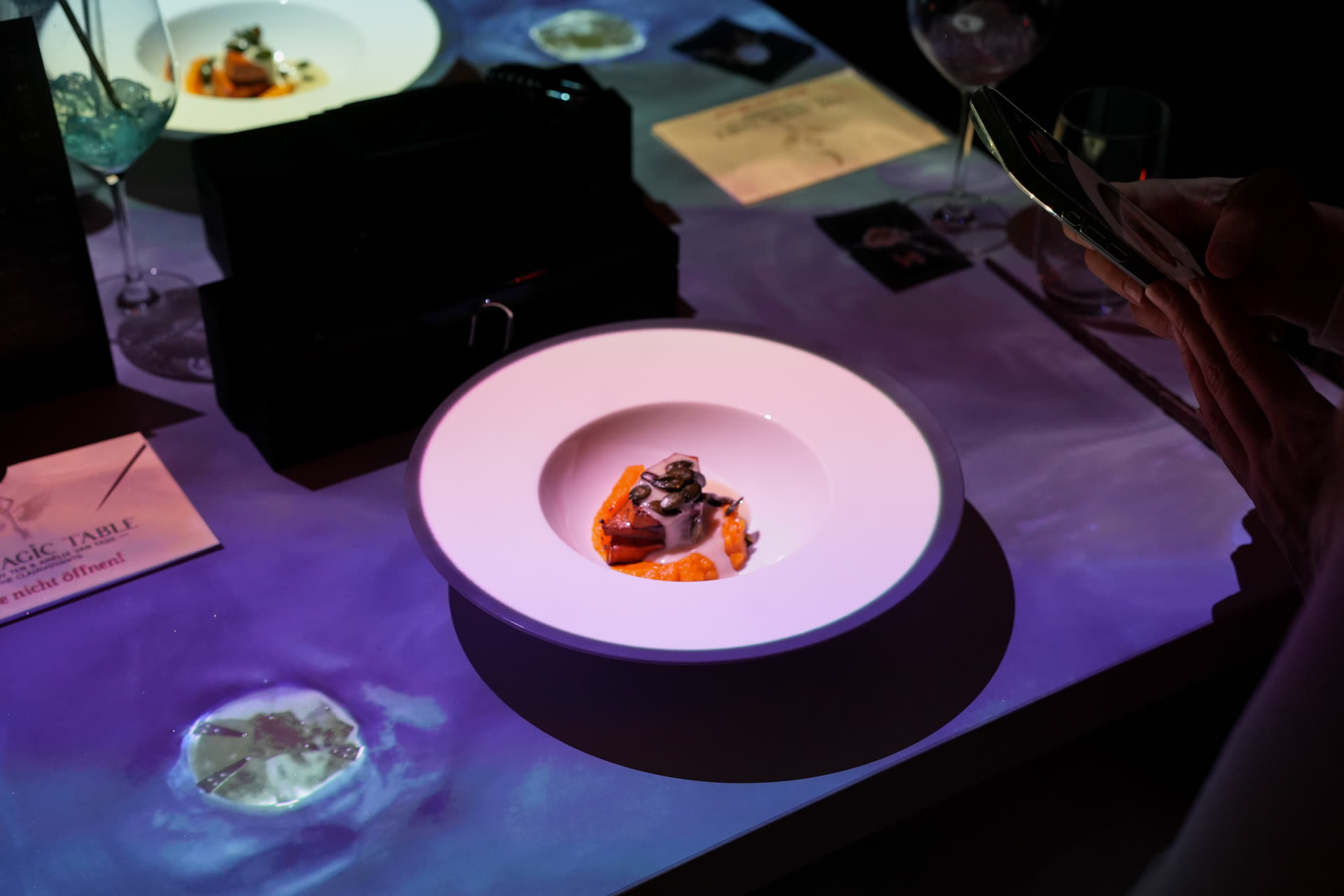 The Magic Table — Dish with purple projection